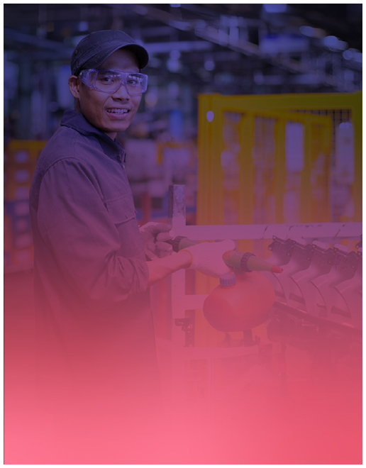Person with safety glasses in an industrial environment