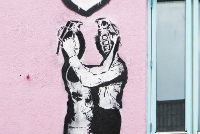 Grafitti of two persons with grenade heads trying to activate each other
