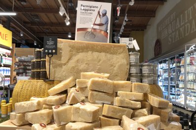 A pile of cheese in a supermarket